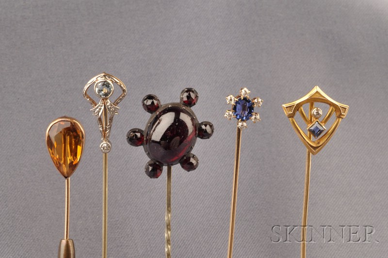 Appraisal: Five Stickpins a garnet cabochon framed by rose-cut garnets blackened