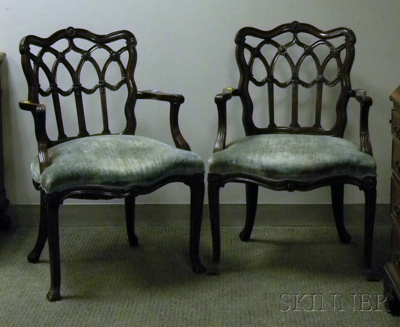 Appraisal: Pair of Georgian-style Upholstered Carved Mahogany Armchairs