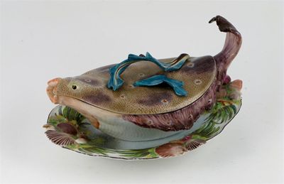 Appraisal: A rare Chelsea fish tureen cover and stand modelled as