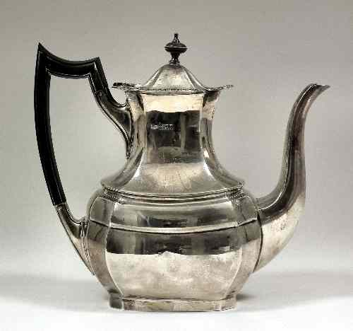 Appraisal: An Edward VII silver coffee pot of rectangular panelled form