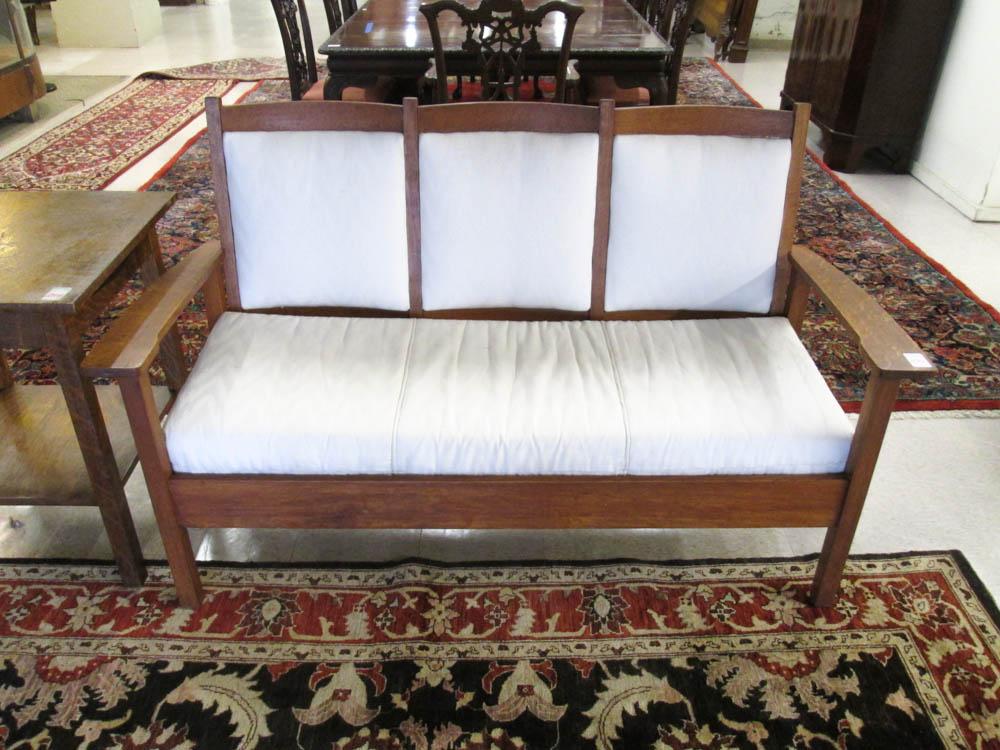 Appraisal: CRAFTSMAN OAK TRIPLE-CHAIR-BACK SETTEE attributed to Stickley Brothers Co Quaint