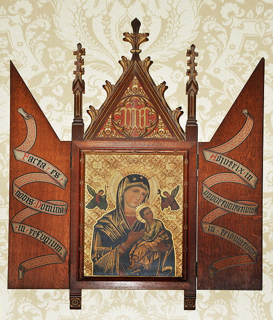 Appraisal: A LATE TH CENTURY ECCLESIASTICAL OAK TRIPTYCH with carved blind