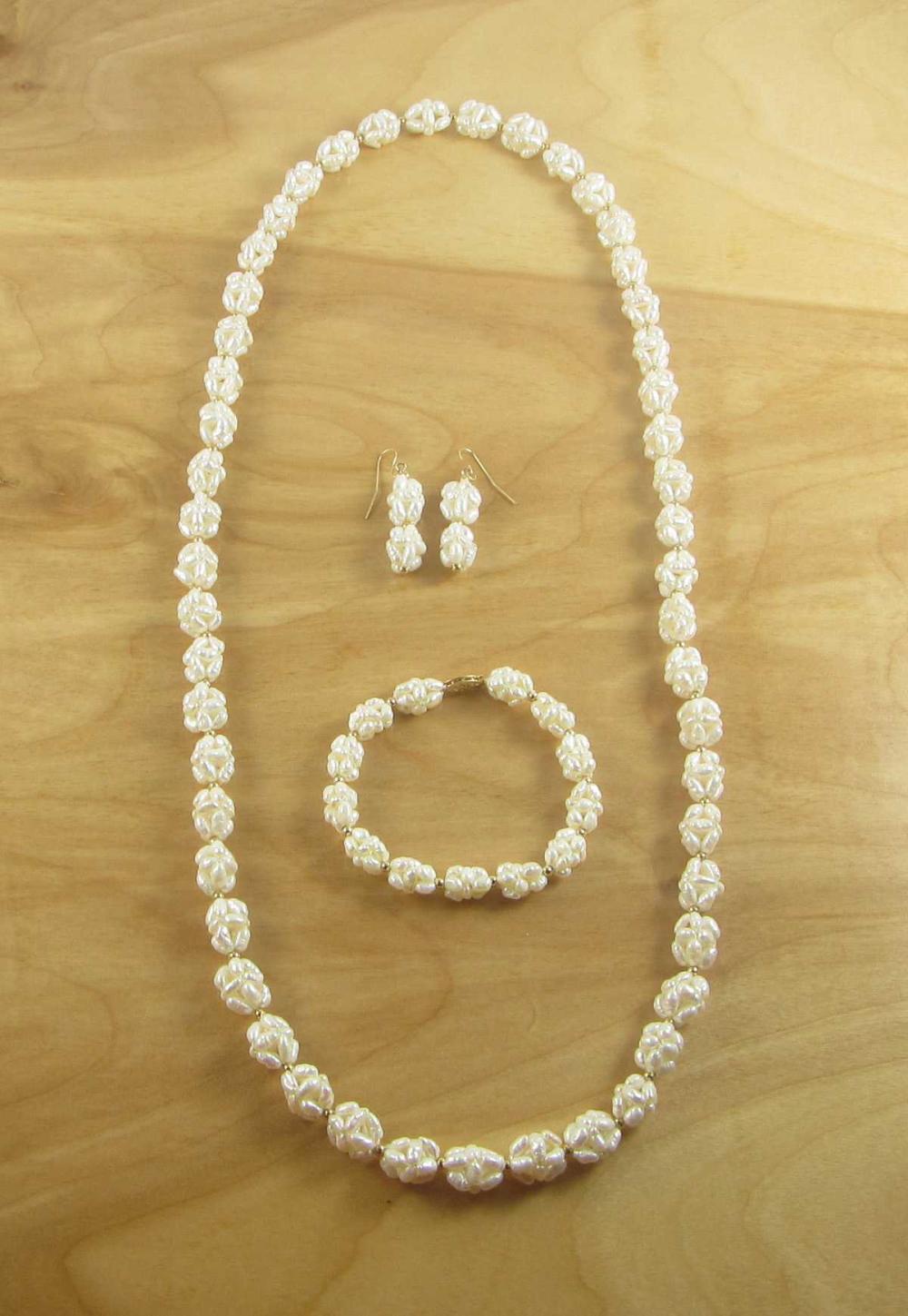 Appraisal: FOUR PIECE PEARL AND YELLOW GOLD JEWELRY SET including a