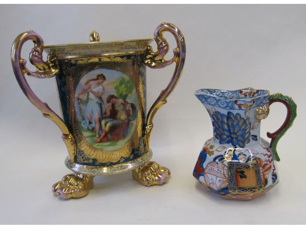 Appraisal: Vienna porcelain tyg with three handles decorated with a transfer