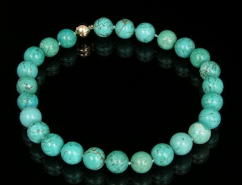 Appraisal: Turquoise Bead Necklace with an Attractive Clasp A strand of