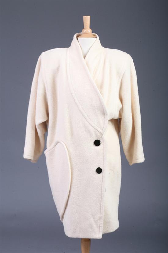 Appraisal: VINTAGE COURR GES CREAM WOOL COAT s Full-length single asymmetric