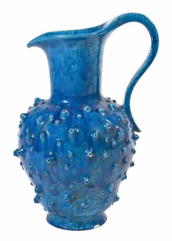 Appraisal: A French Ceramic Oversized Ewer having drip glaze and relief