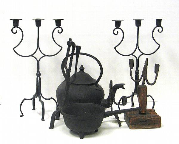 Appraisal: An assembled grouping of iron fireplace accessories lighting devices and