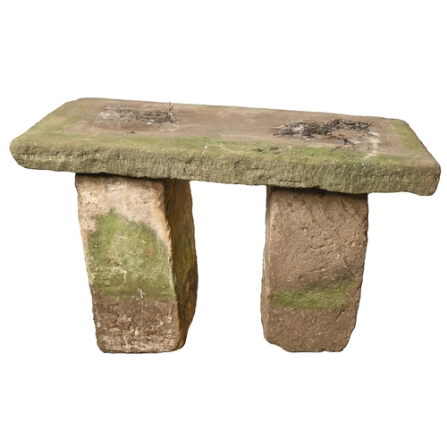 Appraisal: A sandstone garden seat rectangular slab on two uprights cm