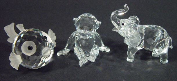 Appraisal: Three boxed Swarovski crystal animals - a monkey elephant and