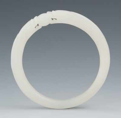 Appraisal: A Carved White Jade Bangle Apprx - D on the