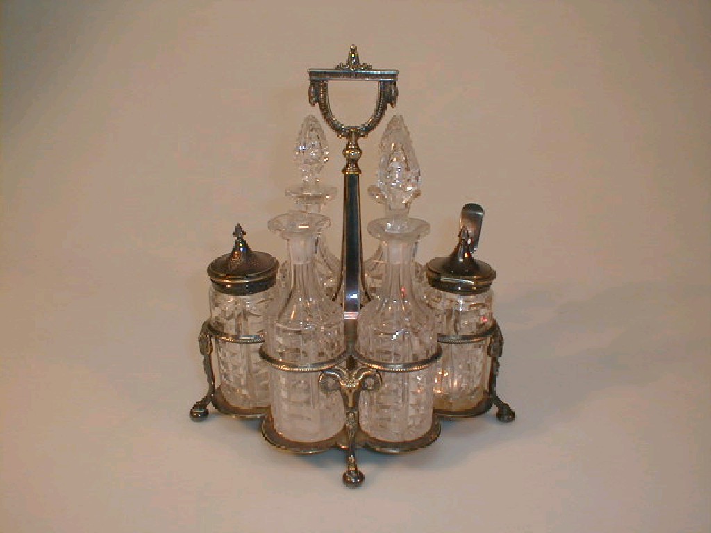 Appraisal: An early thC EPNS cruet stand with six cut glass