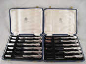 Appraisal: A set of a dozen tea knives in two cases