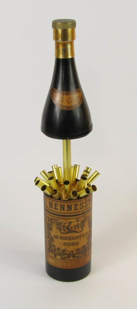 Appraisal: A Jas Hennessy Co Cognac novelty Bakelite musical cigarette dispenser