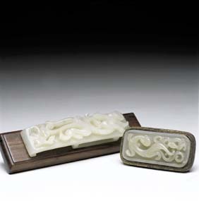 Appraisal: TWO ANTIQUE JADE BELT PLAQUES Two antique Chinese carved grey-white