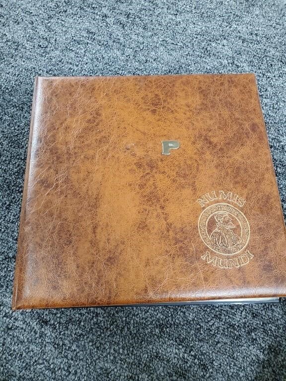 Appraisal: Binder with various worldly coins There are coins from many