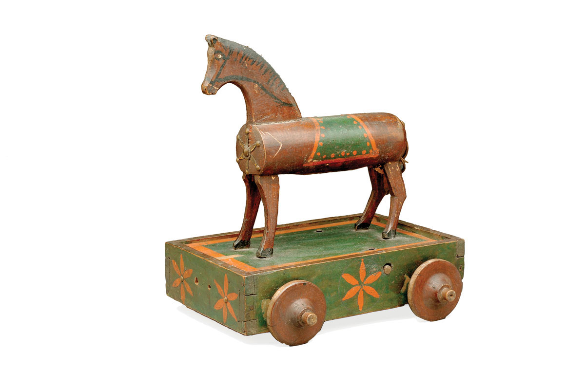 Appraisal: CARVED AND PAINTED BOBBING-WHEEL TOY FOLK ART HORSE Height inches