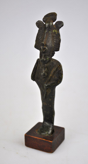 Appraisal: An ancient Egyptian bronze figure of Osiris on wooden base