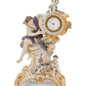 Appraisal: A German Painted and Parcel Gilt Porcelain Figural Mantel Clock