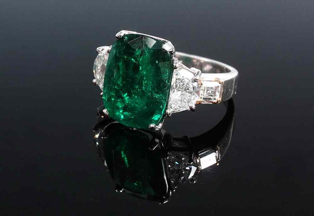 Appraisal: LADY'S RING - One Platinum Emerald and Diamond Ring centered