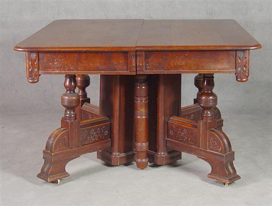 Appraisal: Walnut Victorian Expanding Dining Table Circa Aesthetic Revival carved cluster