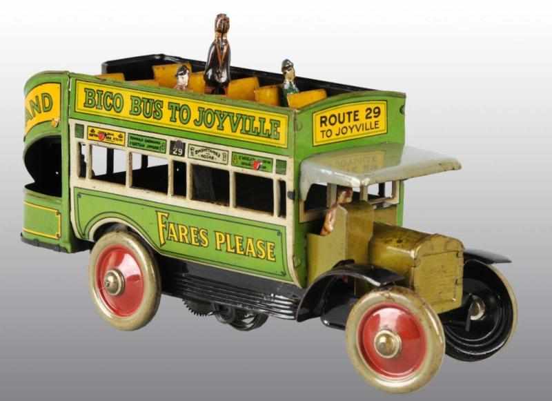 Appraisal: Tin Fischer Bico Bus to Joyville Wind-Up Toy Description German