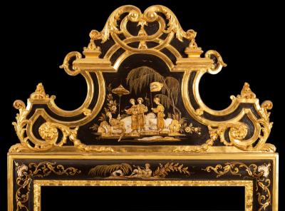 Appraisal: A lacquer and gilt framed wall mirror of Chinoiserie design