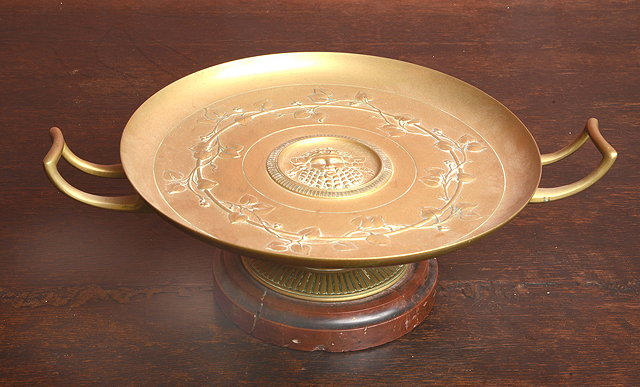 Appraisal: A CAST BRASS AND MARBLE TAZZA in the manner of