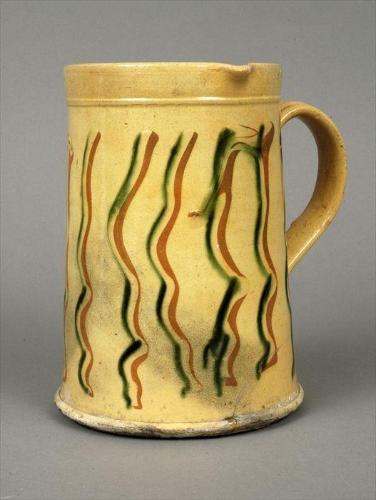 Appraisal: Slip-Decorated Pottery Pitcher in in diam