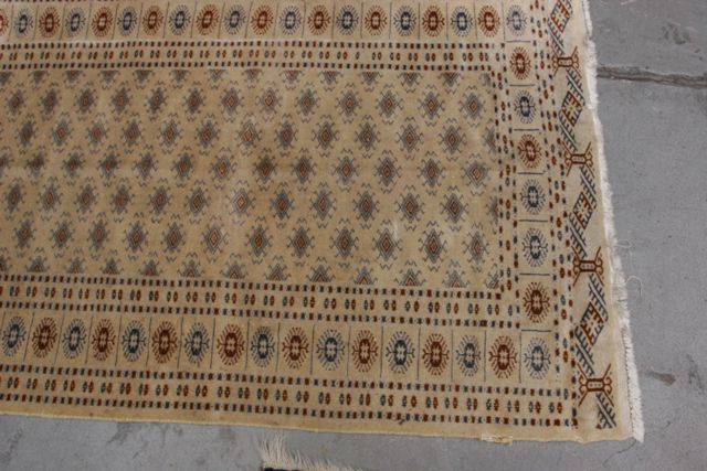 Appraisal: A nomadic rug with central panel of crab medallions with