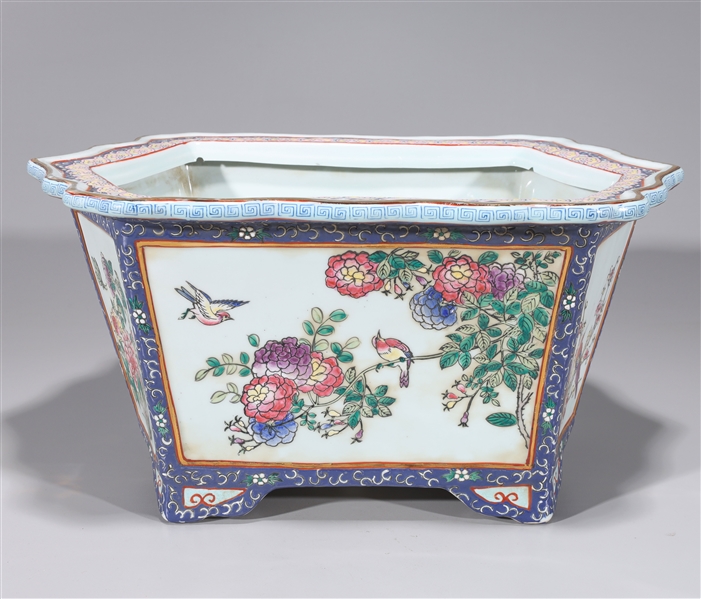 Appraisal: Pair of Chinese enameled porcelain planters each depicting birds and