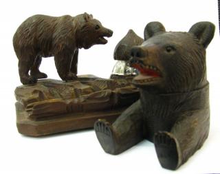 Appraisal: Description Two Black Forest Carved Wooden Bear inkwells including seated