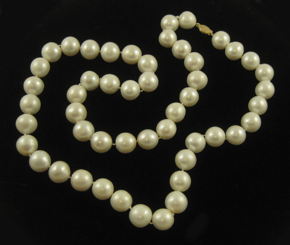 Appraisal: OPERA LENGTH WHITE PEARL NECKLACE strung with well matched white