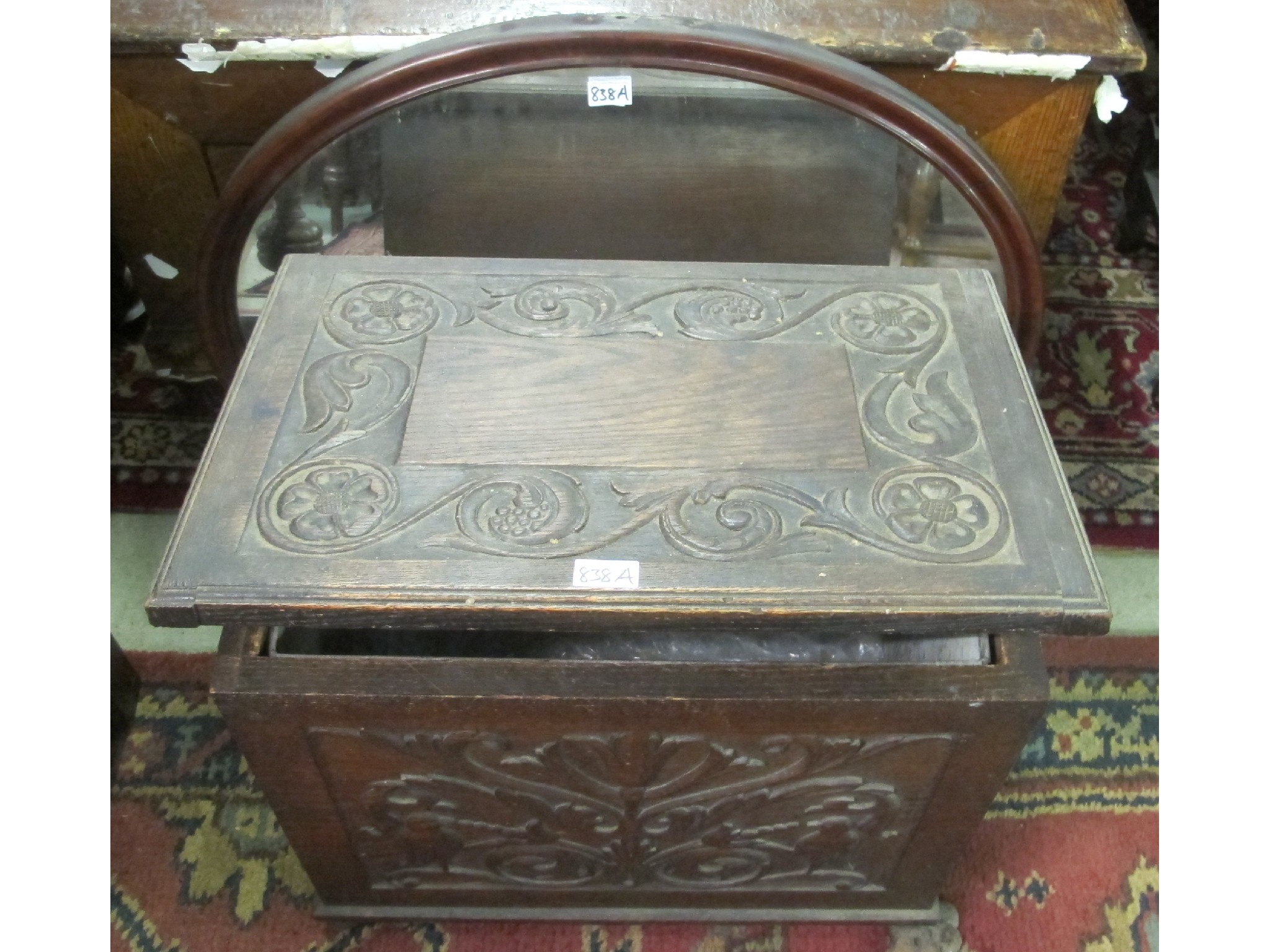 Appraisal: Art Nouveau carved oak coal box with a wall mirror