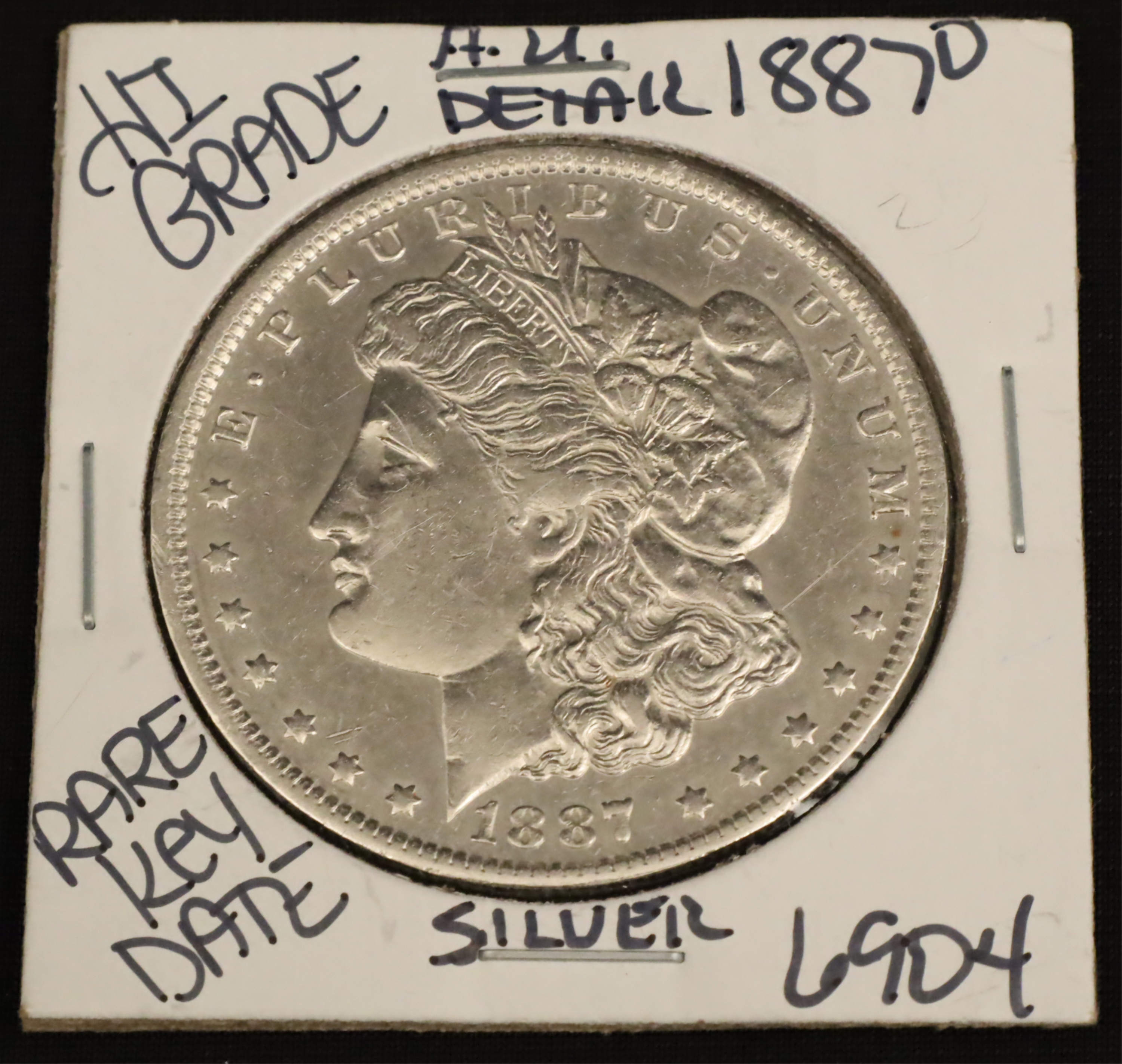 Appraisal: O AU MORGAN SILVER DOLLAR O AU Morgan Silver Dollar