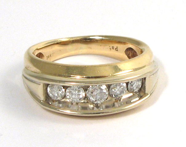 Appraisal: MAN'S DIAMOND AND FOURTEEN KARAT YELLOW AND WHITE GOLD RING