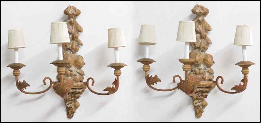 Appraisal: PAIR OF ITALIAN CARVED WOOD THREE-LIGHT SCONCES '' x ''