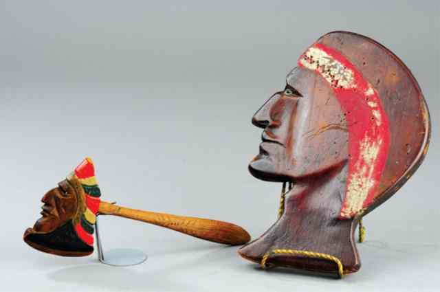 Appraisal: TWO INDIAN THEME CARVED WOOD PIECES Includes Indian head wall