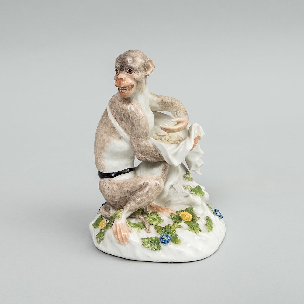 Appraisal: Meissen Porcelain Model of a Monkey Gathering Seeds After J