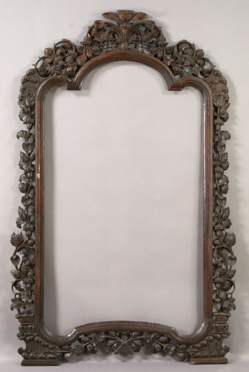 Appraisal: Large Continental Mahogany Rococo-Style Mirror Frame the outer edge profusely