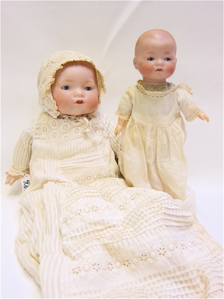 Appraisal: TWO ARMAND MARCEILLES BISQUE HEAD BABY DOLLS the larger with