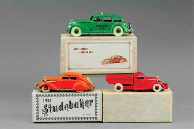 Appraisal: CONTEMPORARY VEHICLE GROUPING Thomas Toys lead examples includes orange Studebaker