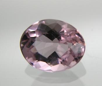 Appraisal: An Unset Natural Orchid-Pink Spinel Carat Oval faceted shape offered