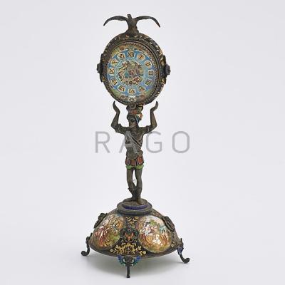 Appraisal: VIENNESE ENAMELED SILVER FIGURAL CLOCK Oval KW KS clock supported