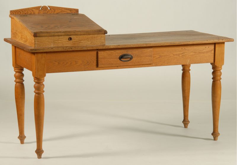 Appraisal: SCHOOLMASTER'S DESK Late th CenturyIn oak and chestnut Lift-top writing