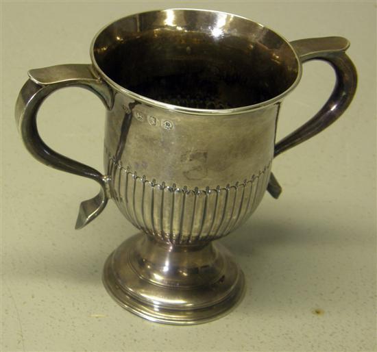 Appraisal: George II two-handled silver cup with half-gadrooned body and scrolling