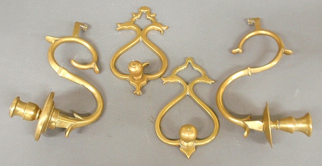 Appraisal: - Two similar two-part cast brass wall sconces each approx