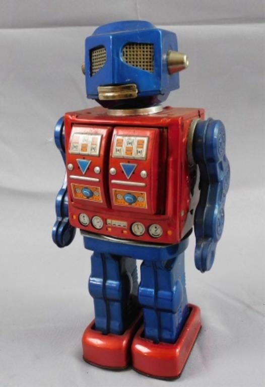 Appraisal: JAPANESE HORIKAWA LITHOGRAPHED TIN BATTERYoperated robot ca Bug eye head