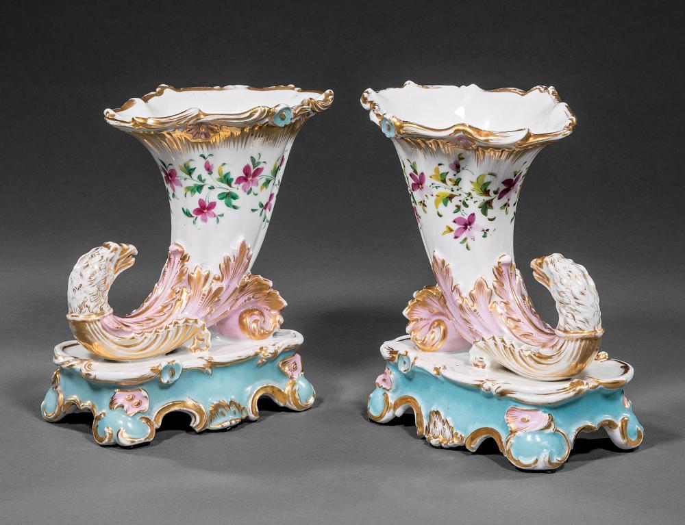 Appraisal: Pair of Paris Polychrome and Gilt Porcelain Rhyton Vases mid-