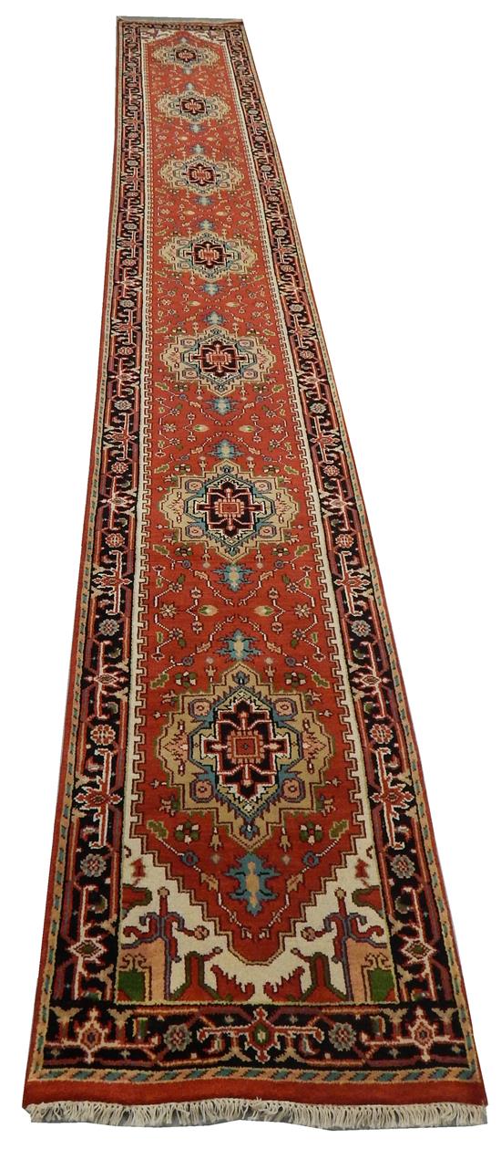 Appraisal: RUG Agra Serapi runner '' x '' brick red field